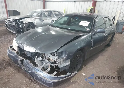 1998 Lincoln Town Car Signature из США, поврежденный, VIN 1LNFM82W8WY716830